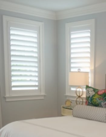 White plantation shutters with hidden tilt rods in Minneapolis